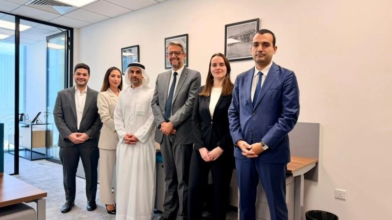 Hussain Al Tajir, third from left, with Jean-Louis Girodolle and colleagues during a UAE office visit