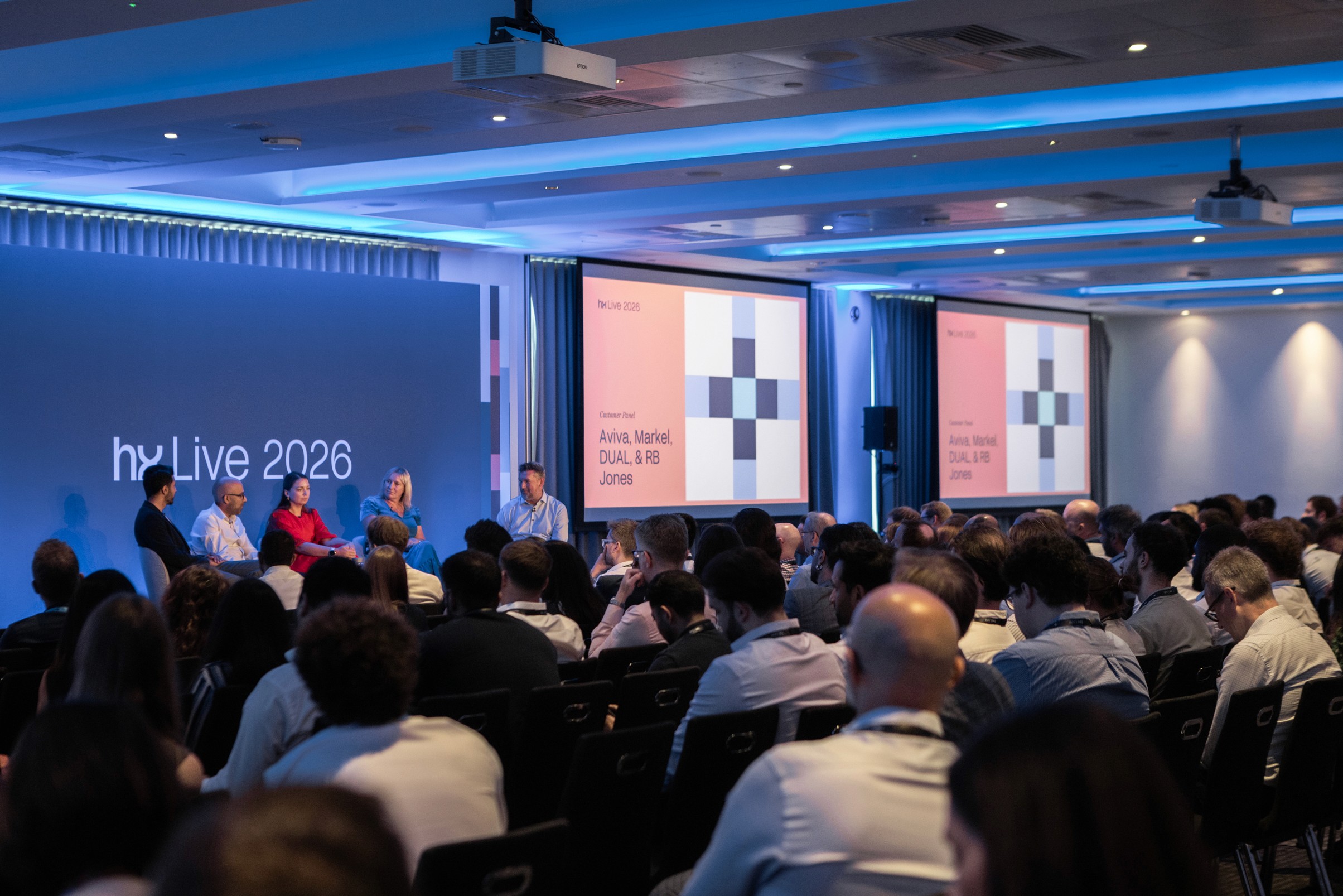 Insurance professionals attending a customer panel at hx Live 2026