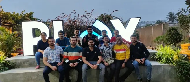 HyperVerge colleagues posing together outdoors