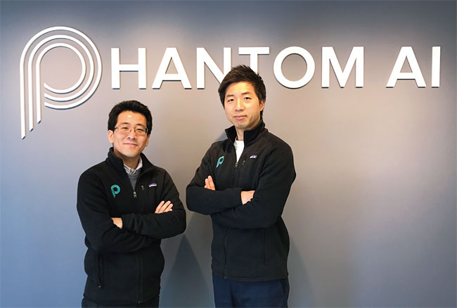 Hyunggi Cho and Chan Kyu Lee standing beneath the Phantom AI name