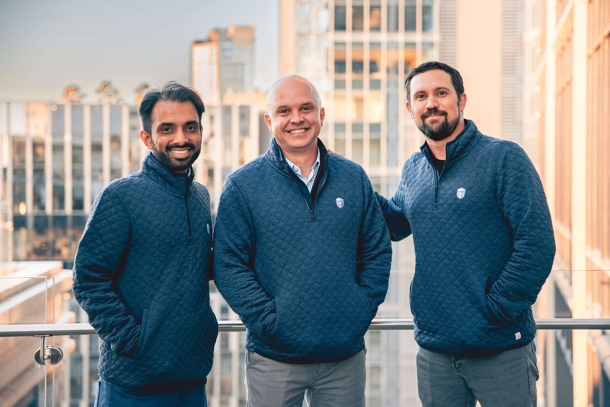 Protect AI co-founders Badar Ahmed, Daryan Dehghanpisheh and Ian Swanson standing together