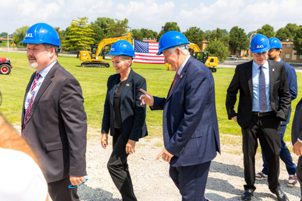 Officials and ICL executives wearing blue hard hats at the August 2023 St. Louis groundbreaking