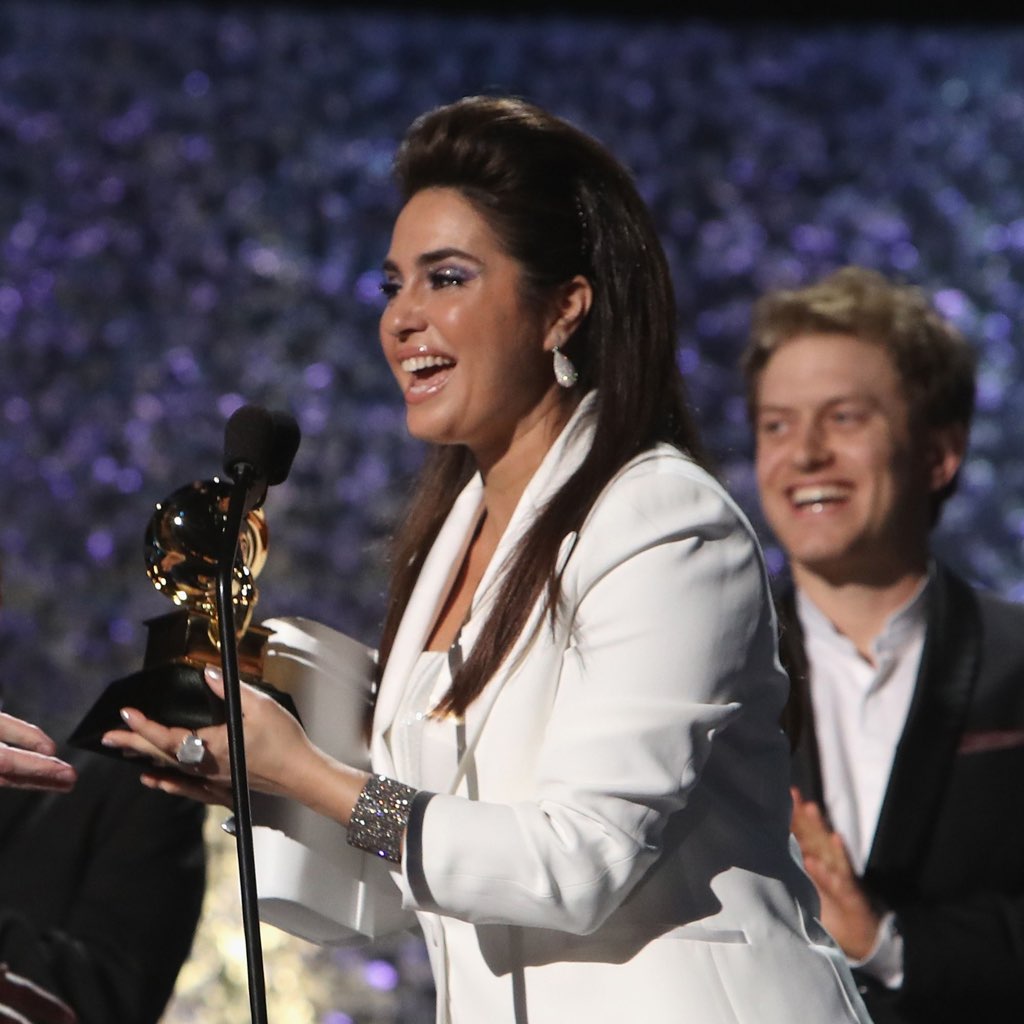 Emily Lazar accepting a Grammy onstage