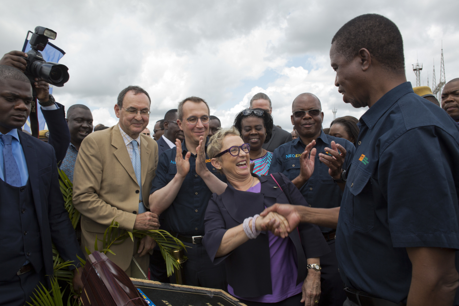 Officials and project partners celebrating at the Bangweulu solar inauguration