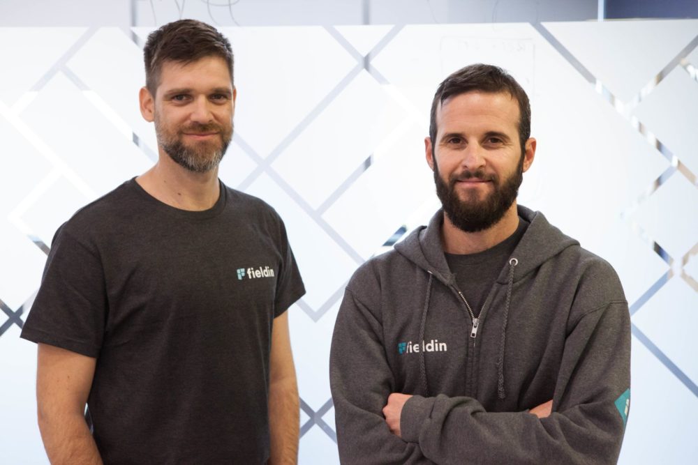 Fieldin co-founders Boaz Bachar and Iftach Birger standing together