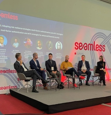 Igor Tomych seated with fellow panellists at Seamless Europe