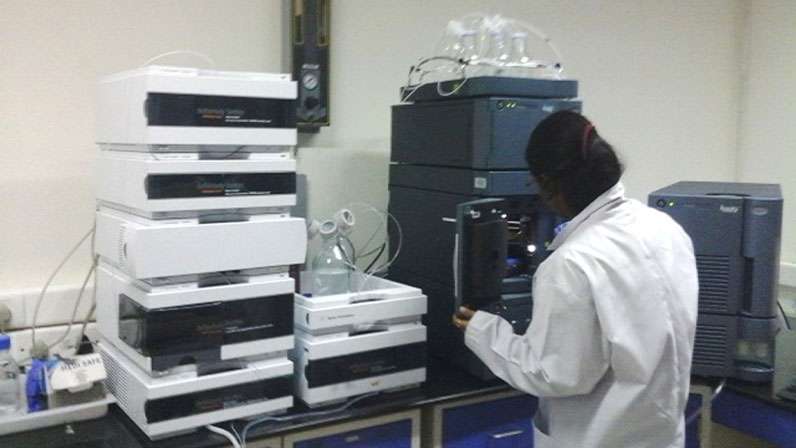 Scientist working with analytical equipment at IKP A-LABS