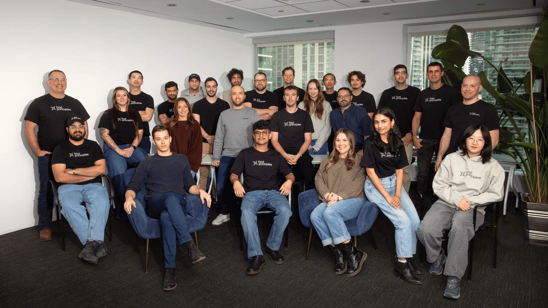 The FirstPrinciples team gathered for a group photograph