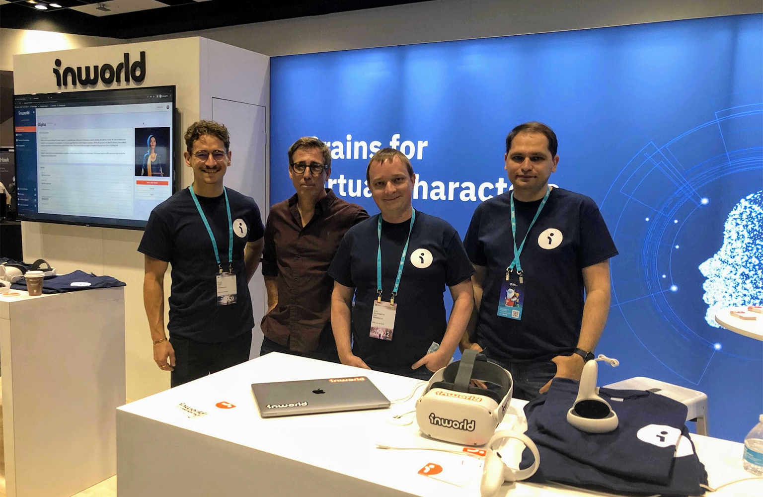 Ilya Gelfenbeyn, second from right, with the Inworld team at a booth displaying virtual character technology