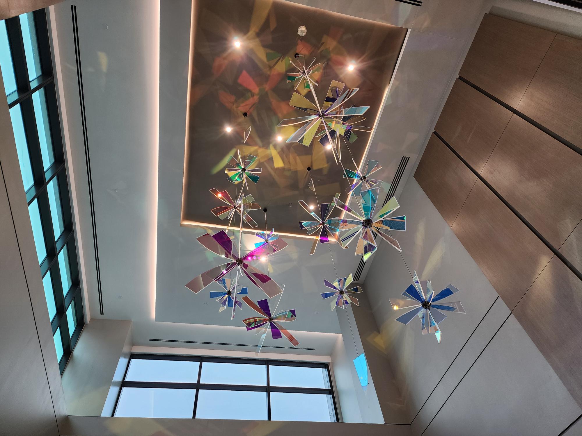 Baylor Scott and White Health interior featuring suspended colored geometric elements