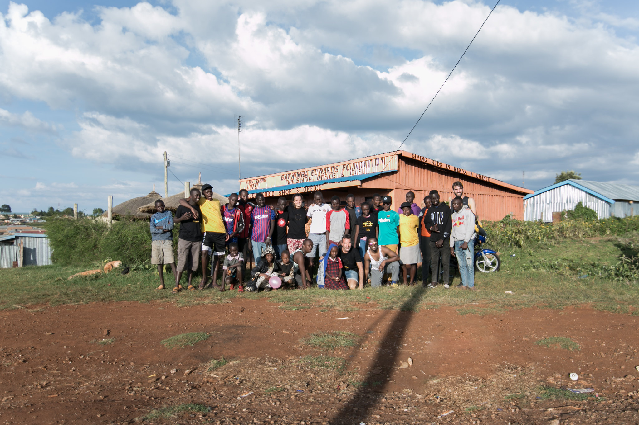 Imagine Africa participants and hosts gathered outside the Gathimba Edwards Foundation building in Kenya