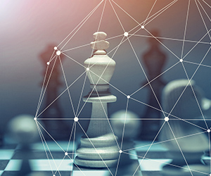 A chess king overlaid with connected lines, representing strategy