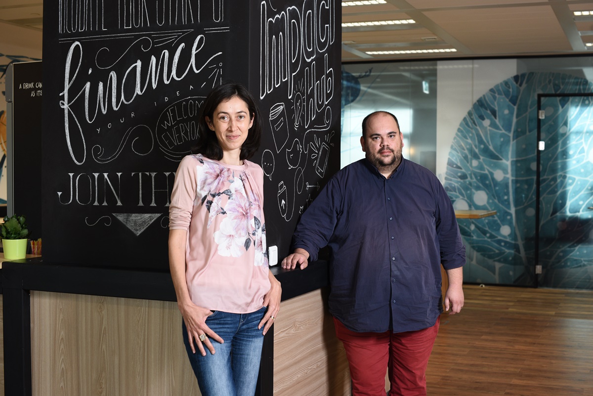 Co-founders Oana Craioveanu and Vlad Craioveanu standing together in an Impact Hub workspace