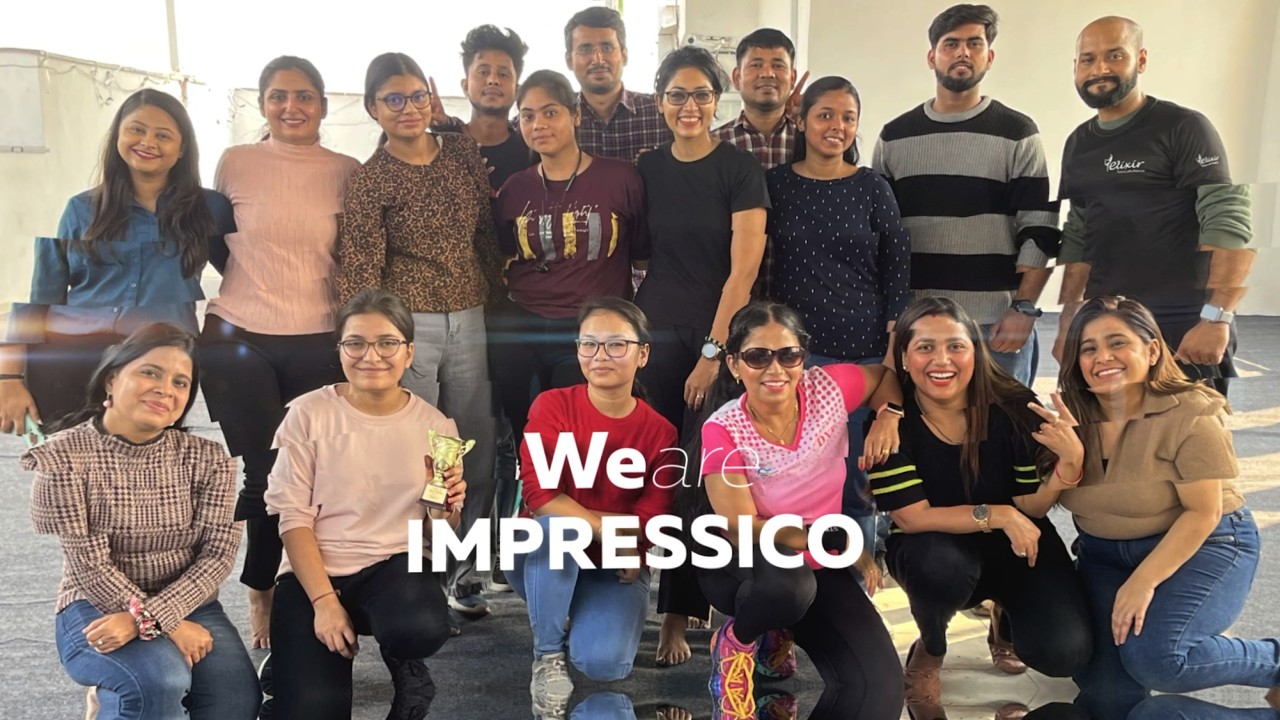 Impressico colleagues posing together after a company Zumba session