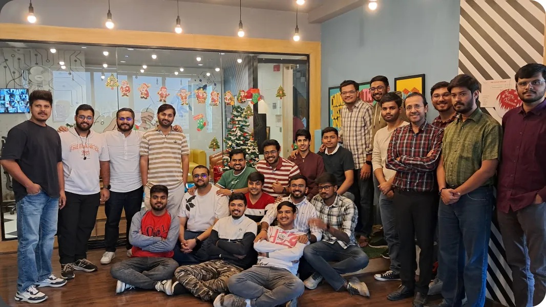 Infocusp colleagues gathered for a group photograph in their office