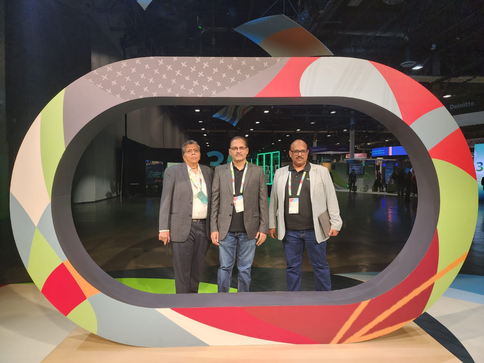Three INFOLOB team members at Oracle CloudWorld 2023