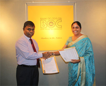 Bank of Ceylon and IronOne representatives holding agreement documents