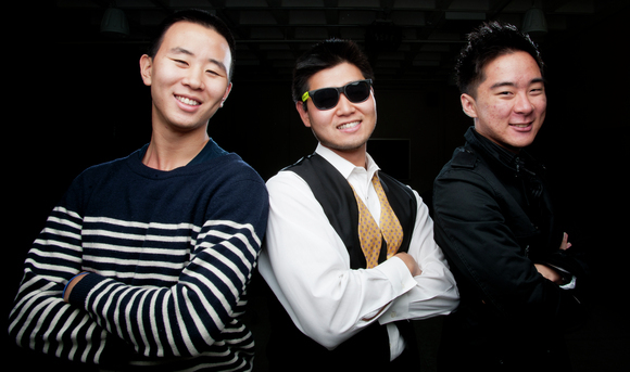 Ingwon Chae, Richard Yoon wearing sunglasses, and Eddie Ha pose together for the MIT Gangnam Style production