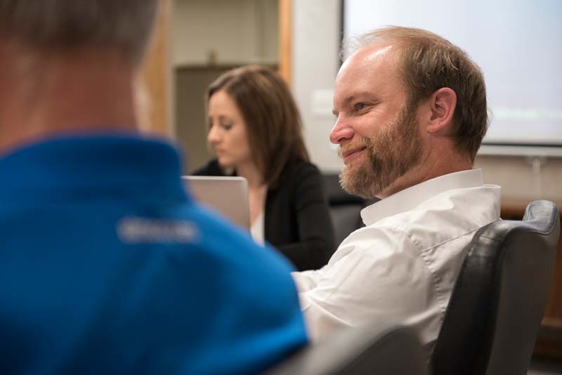 Colleagues participating in a meeting at an Innovance business