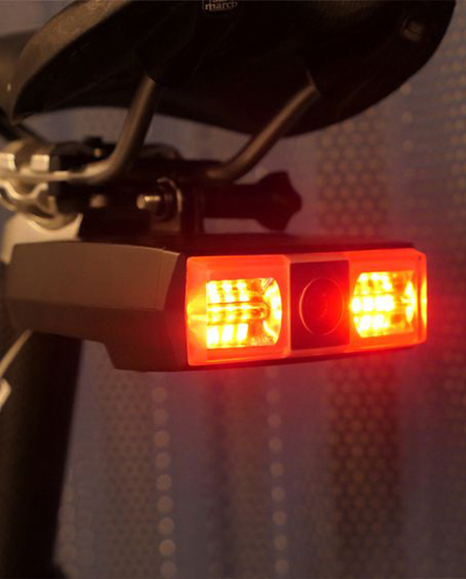 An illuminated rear bicycle light featured in Robotics Factory’s official product photographs