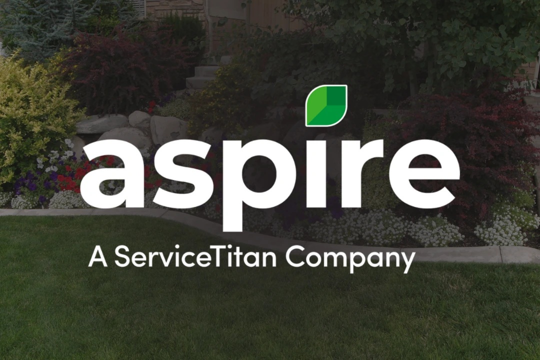 Aspire partner graphic over a landscaped garden
