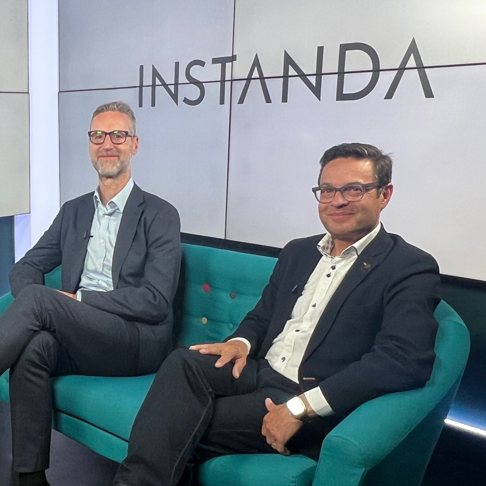 INSTANDA co-founders Tim Hardcastle and Derek Hill seated together