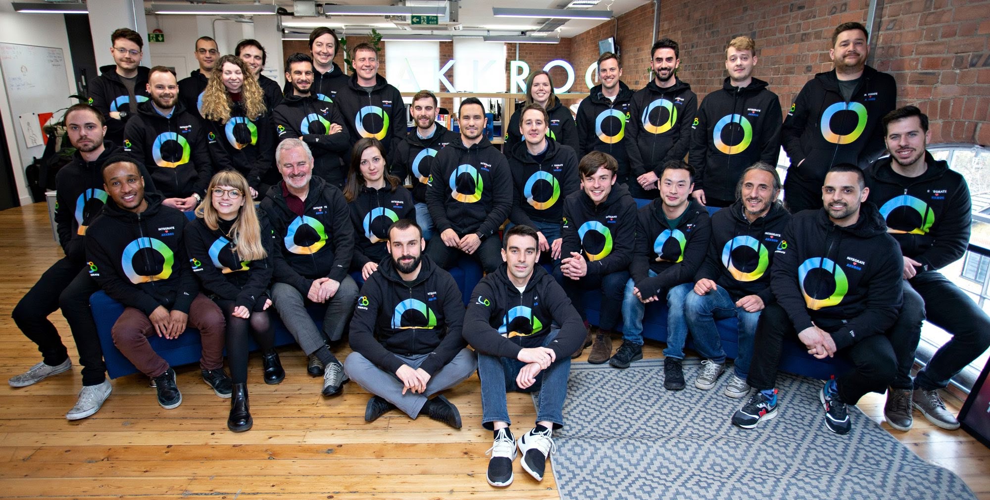 The Akkroo and Integrate team gathered in an office around the April 2019 acquisition