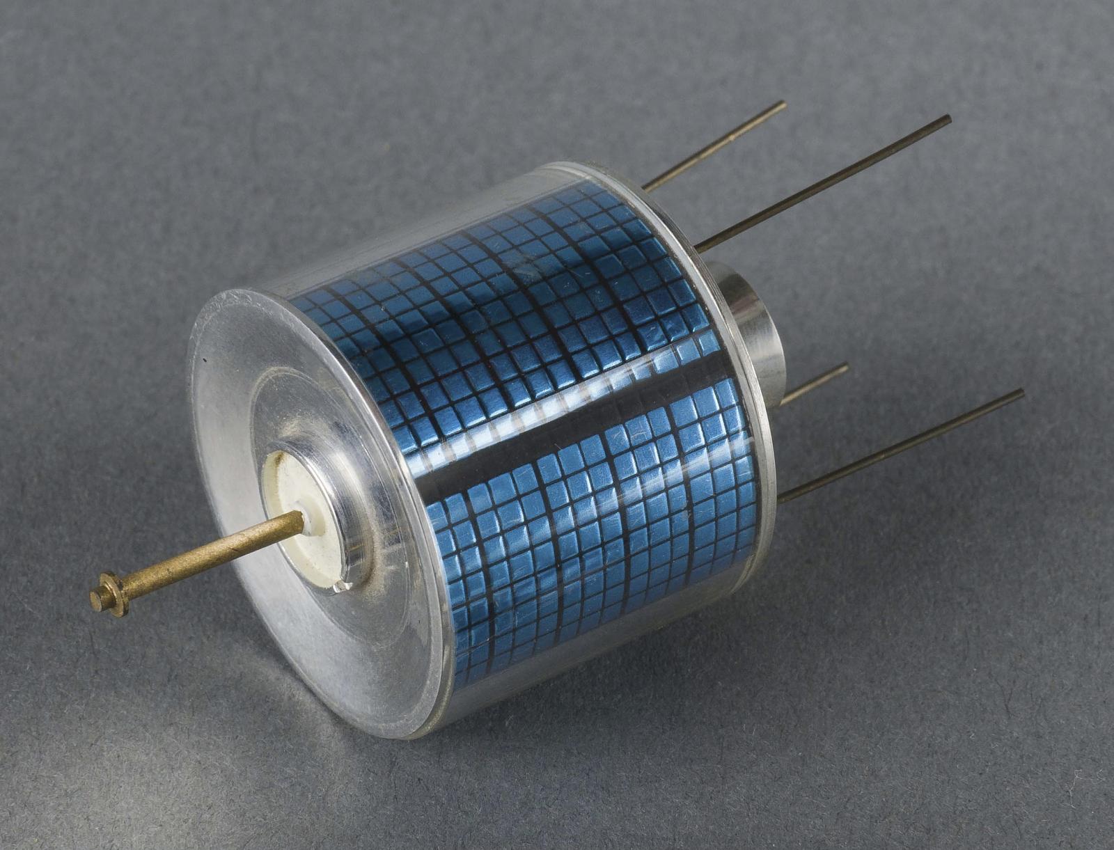 Small scale model of Intelsat I, also called Early Bird, with its cylindrical body and antenna rods