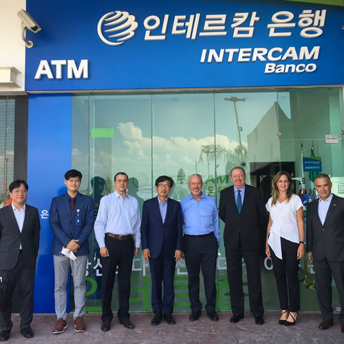 Korean diplomatic visitors and Intercam representatives outside the Apodaca service center in 2021