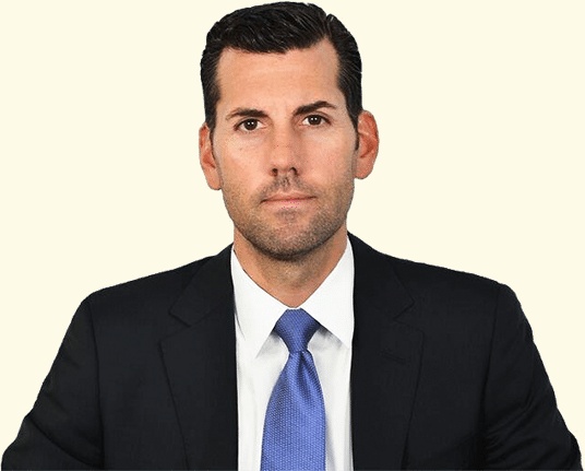Dustin DiMisa, ICG co-founder and chief executive, wearing a dark suit and blue tie