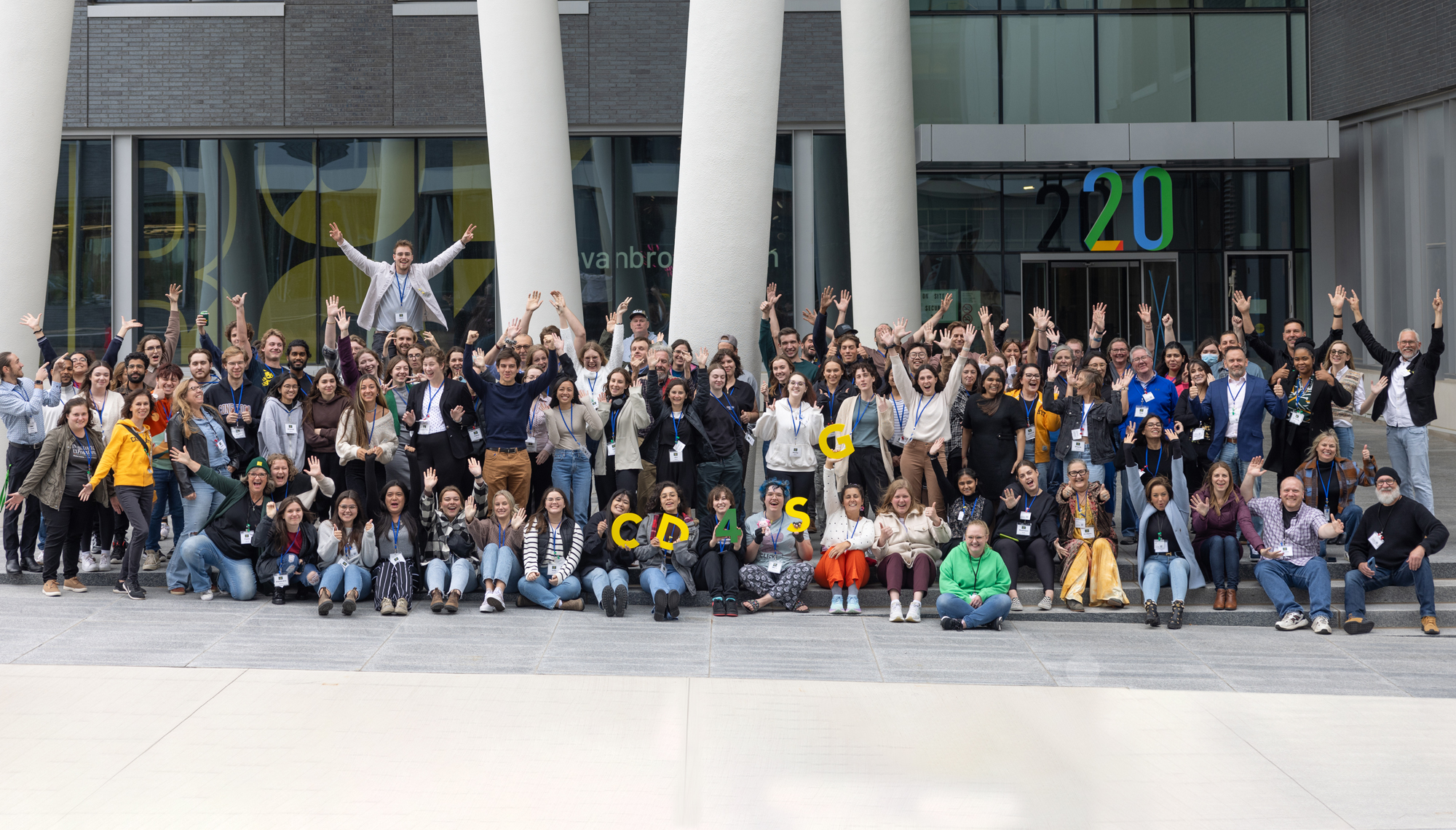 A large Creative Day for Social Good group outside a Waterloo building