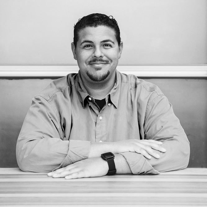 InVision co-founder Clark Valberg seated at a table