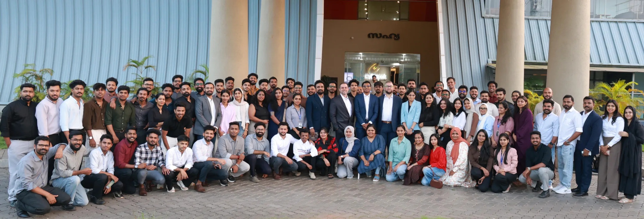 IOCOD team and guests gathered outside the Sahya Building