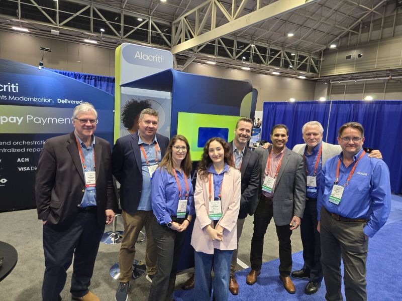 Irit Gillath standing with Alacriti colleagues at the 2025 Nacha Smarter Faster Payments conference