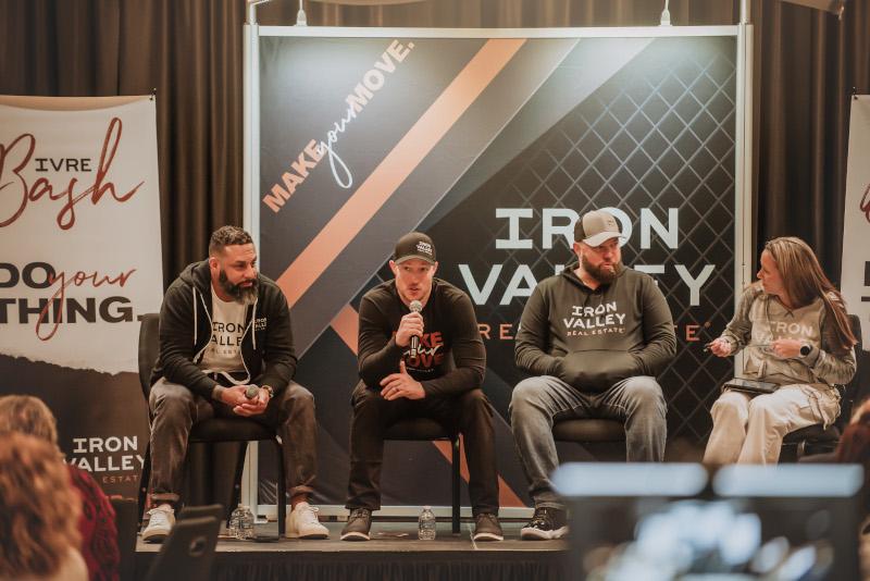 Corey Kaplan, Adam Gamble, Rob Cleapor and Lisa Loser seated onstage at an Iron Valley event