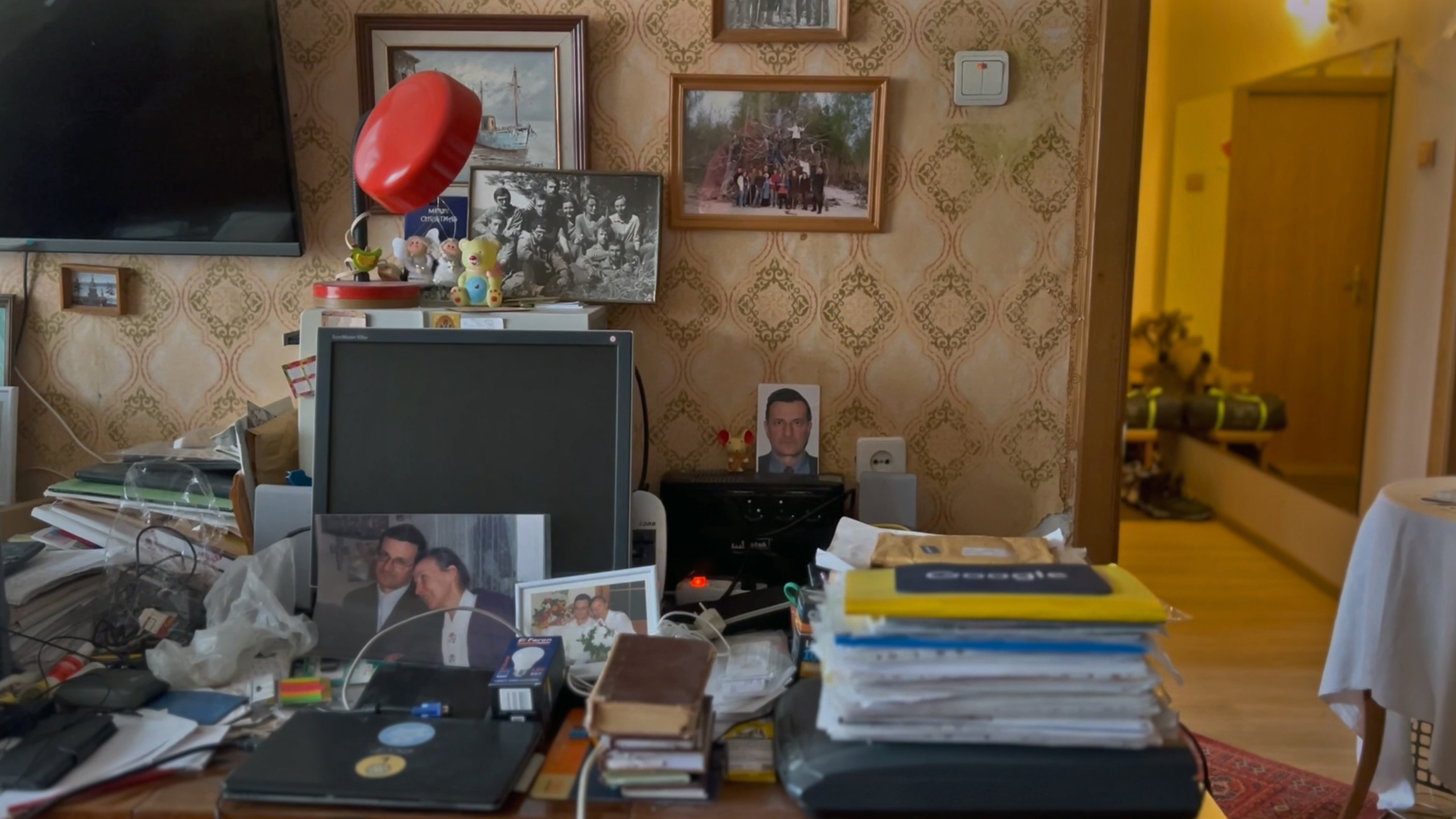 Books and papers in Volodymyr Shostak’s room, seen in his daughter’s documentary