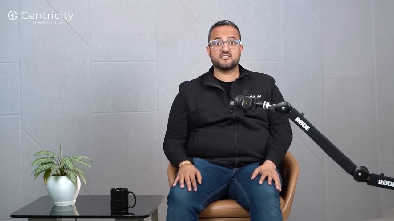 Ishkaran Chhabra seated beside a microphone during Centricity's private-credit discussion