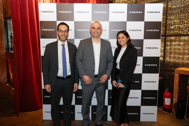 Ismail Badereldine at the centre of a group photograph at FinBursa’s launch