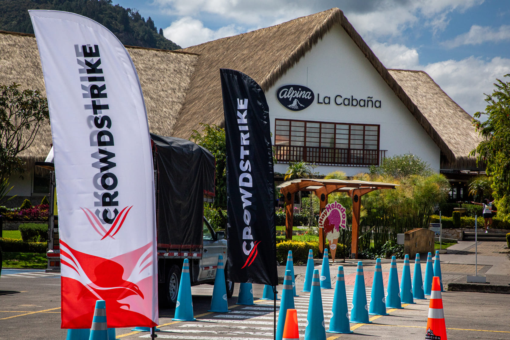 CrowdStrike flags and a driving course at La Cabaña in Colombia during a client road experience