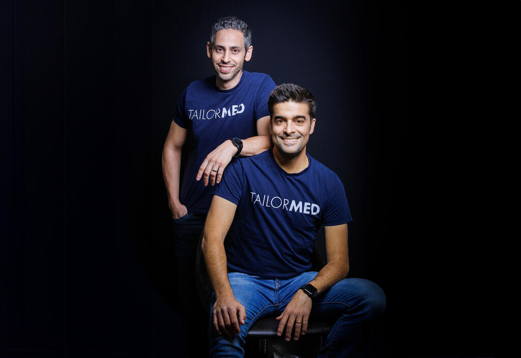 TailorMed co-founders Adam Siton and Srulik Dvorsky wearing company T-shirts