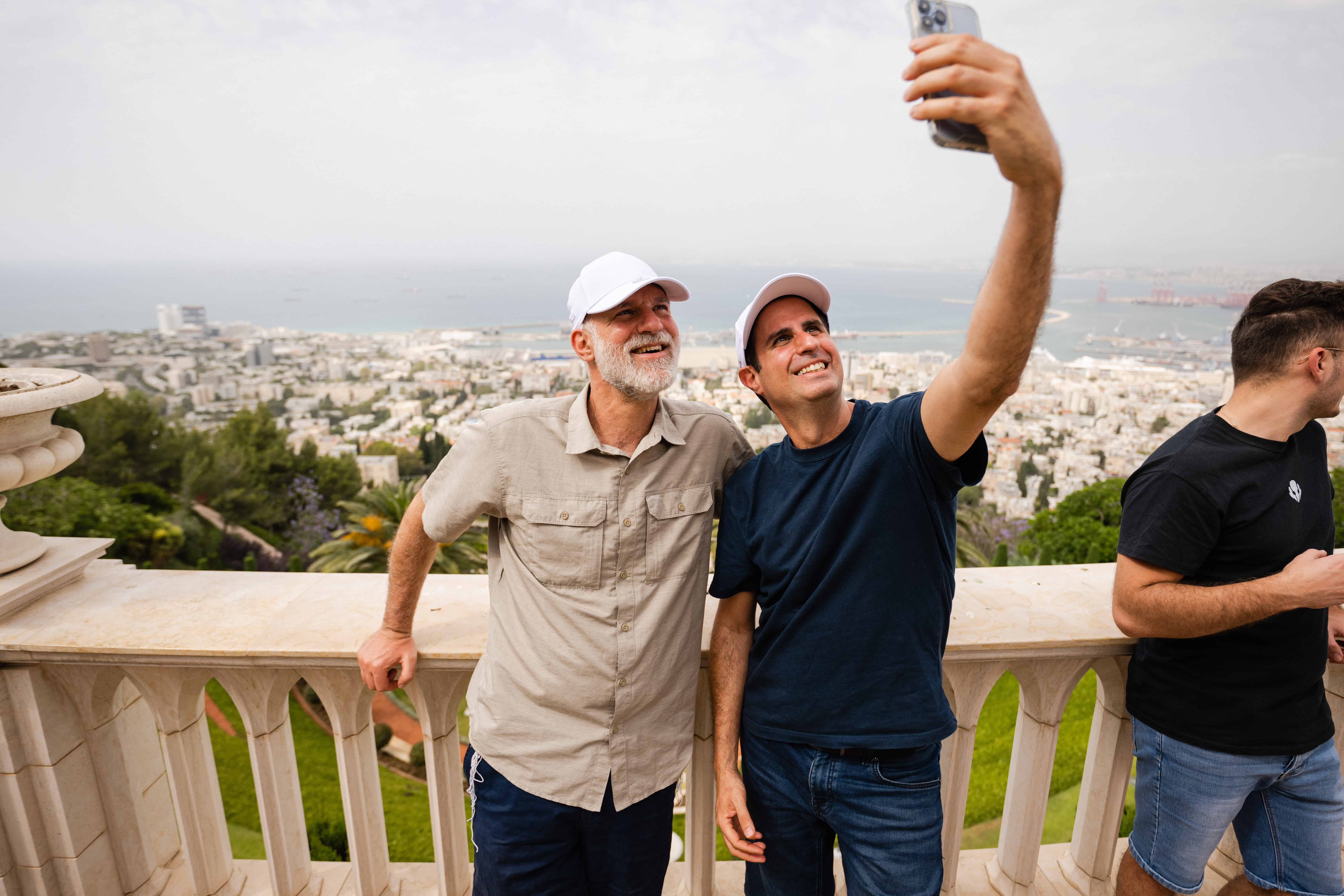 People posing for a phone photograph in Istra’s Life@Istra gallery