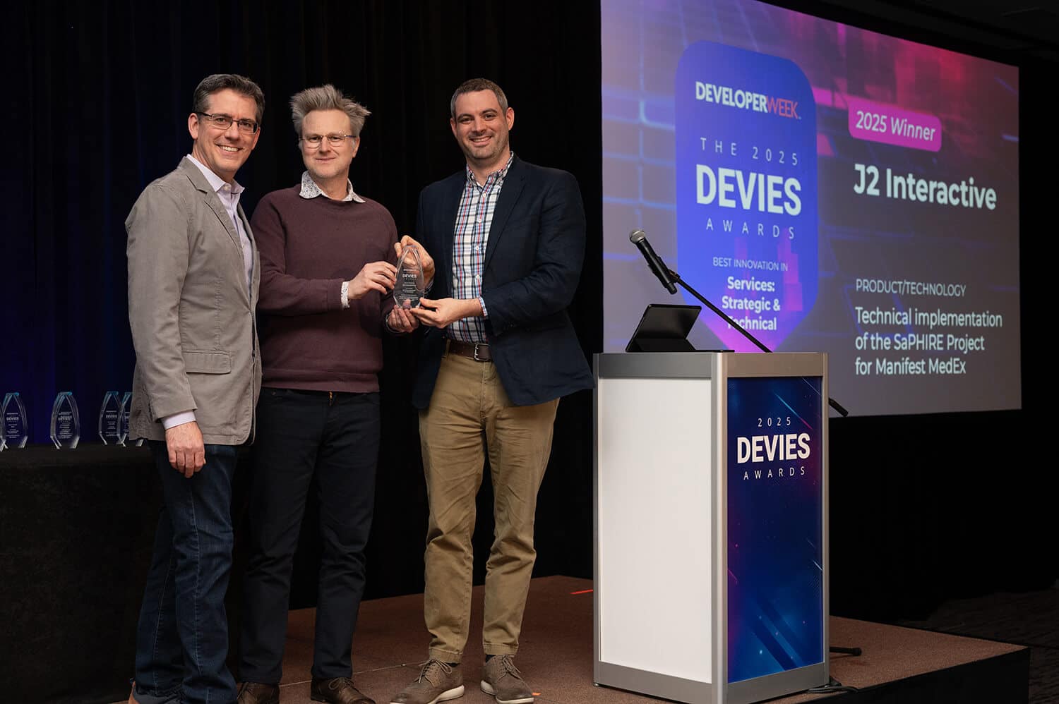 J2 team members at the 2025 DeveloperWeek awards event
