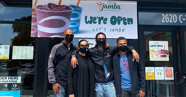 Four members of the Redmon family outside the Alameda Jamba store in 2020