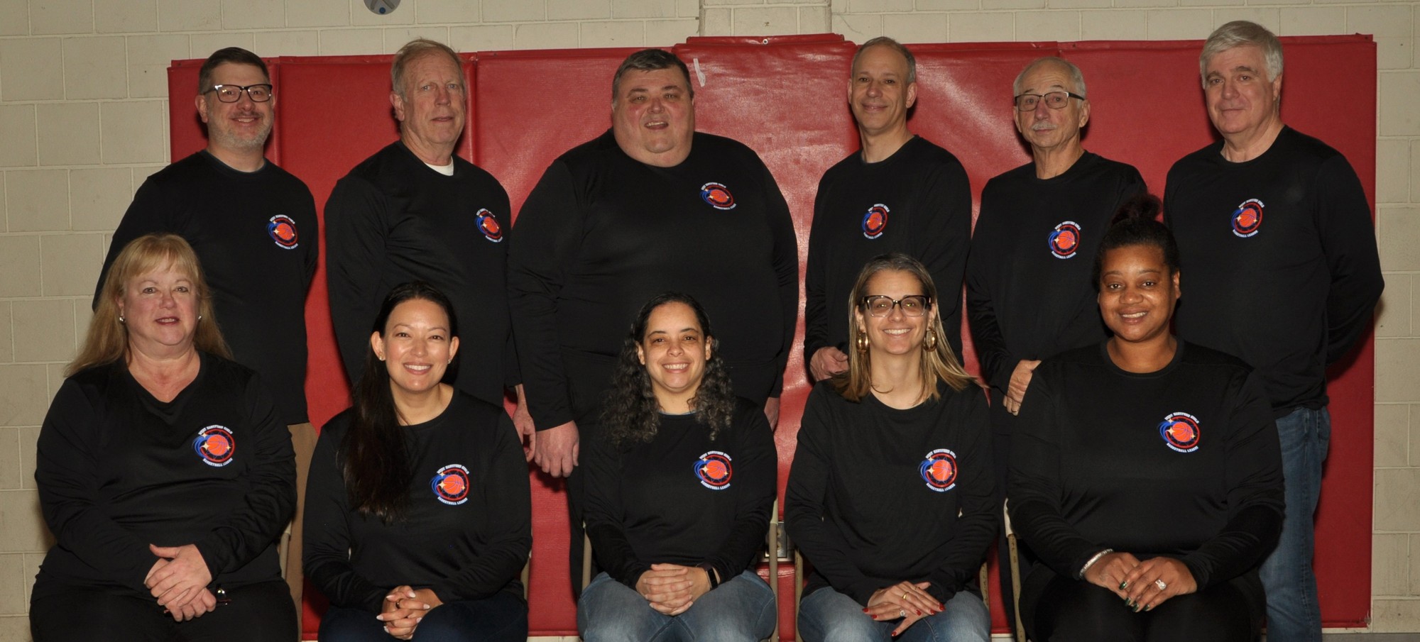 The 2026 West Hartford Girls Basketball League board, with James Bargon standing at the far right