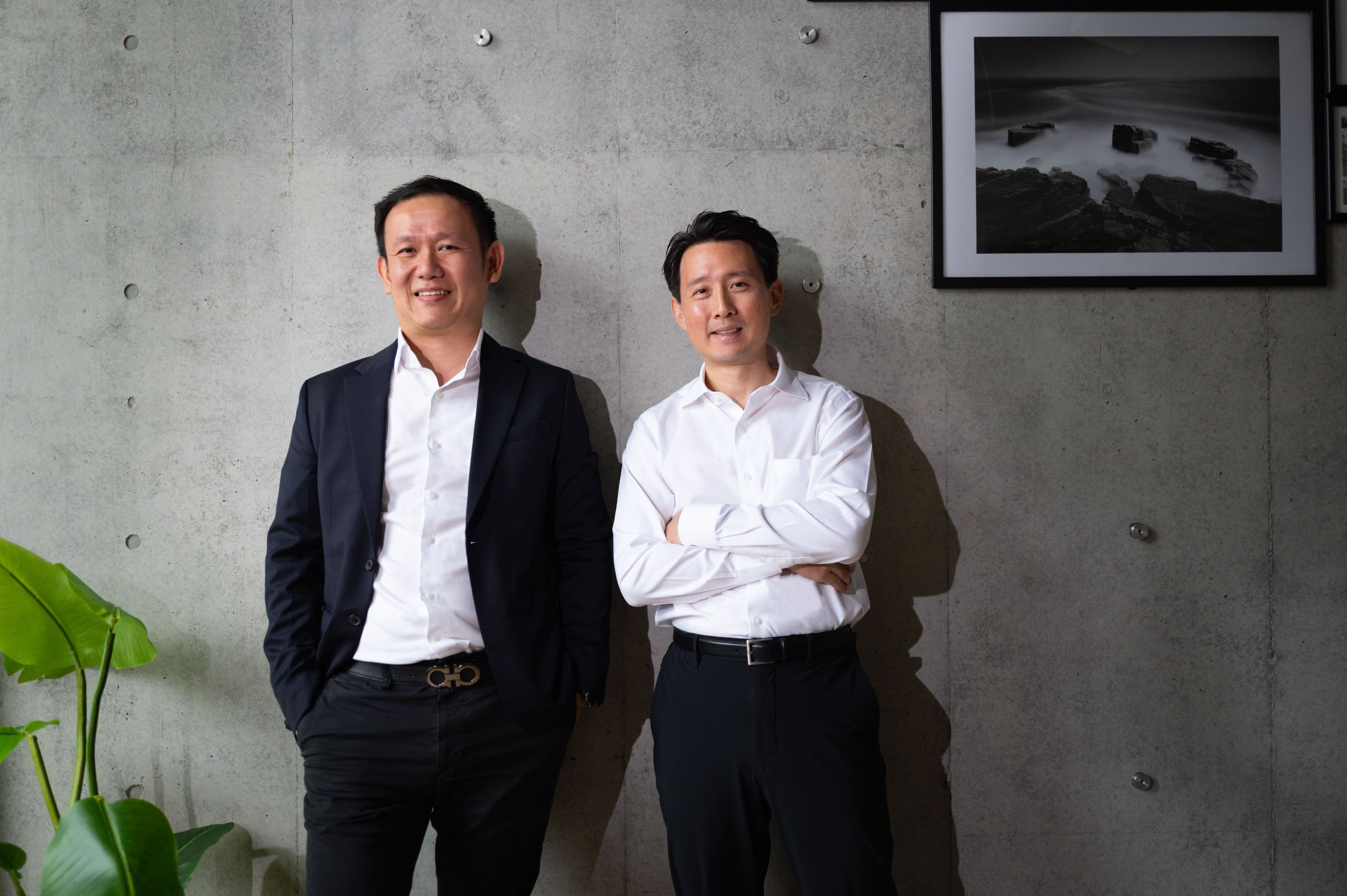MetroResidences co-founders Lester Kang, left, and James Chua, right, standing together