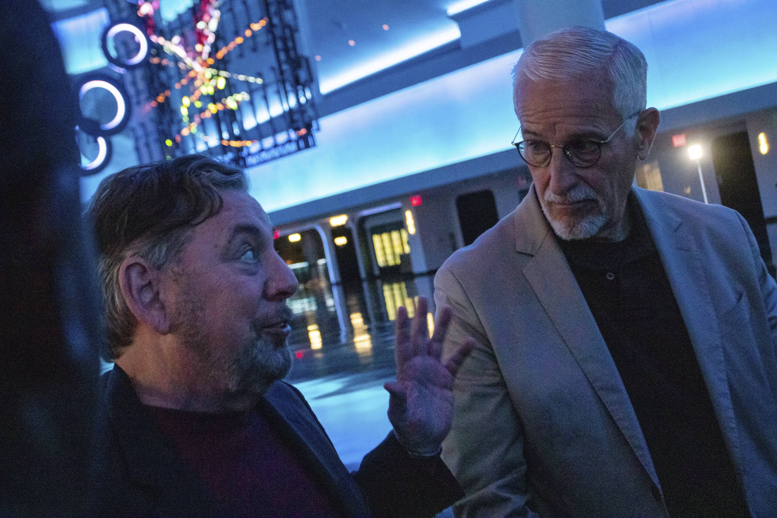 James Dolan at left talks with David Dibble inside Sphere