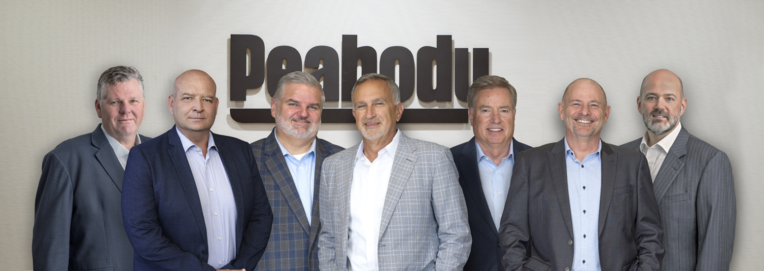 Peabody’s seven executive officers, with Jim Grech fourth from the left
