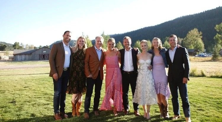 The Manley family gathered outdoors at The Ranch at Rock Creek