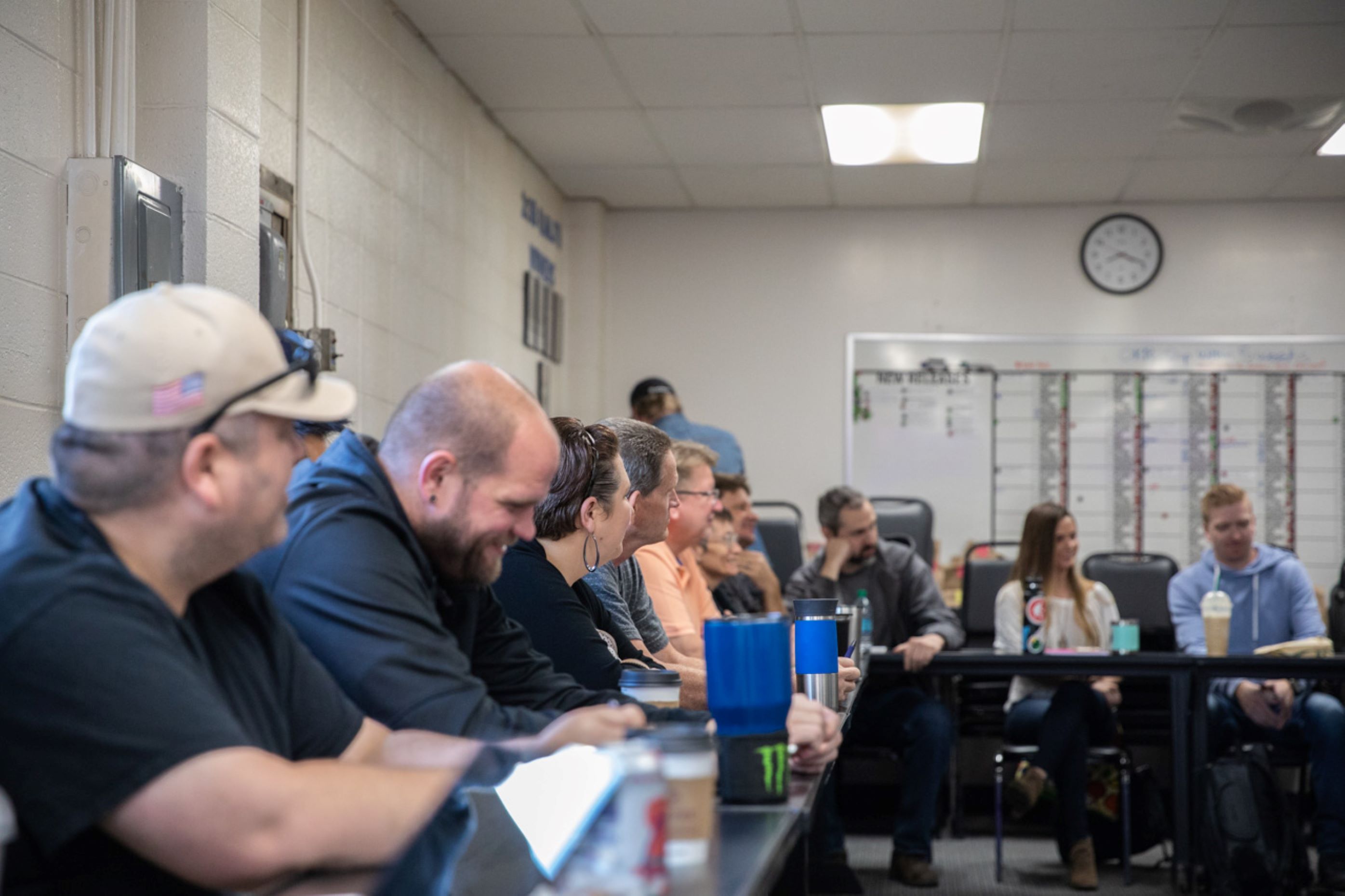 SAC team members seated together during an internal company gathering