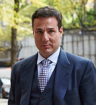 Jamie Diaferia wearing a dark suit outdoors in the photograph accompanying his 2017 interview